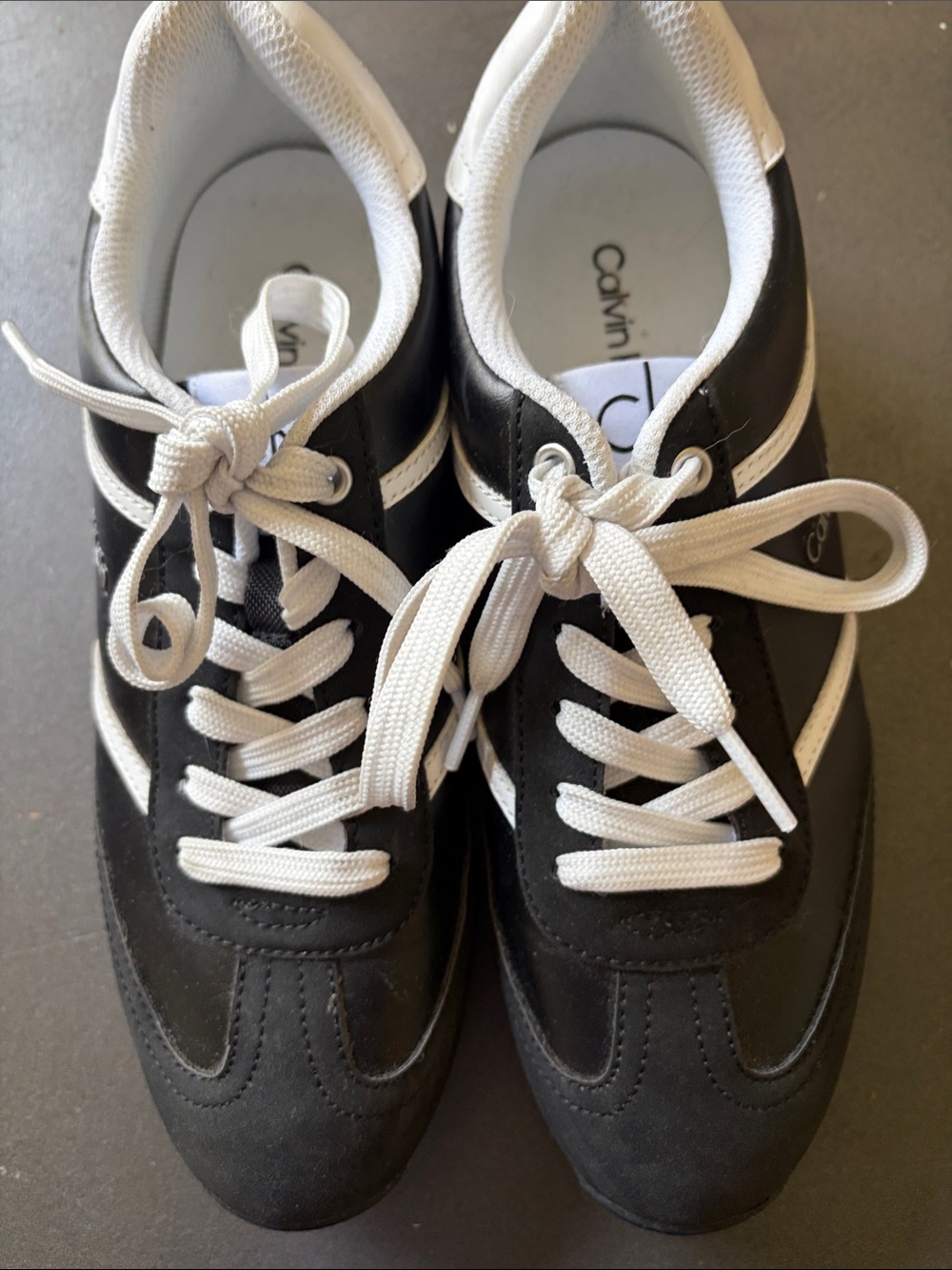 Calvin Klein women’s Black and White Low-Top Sneakers